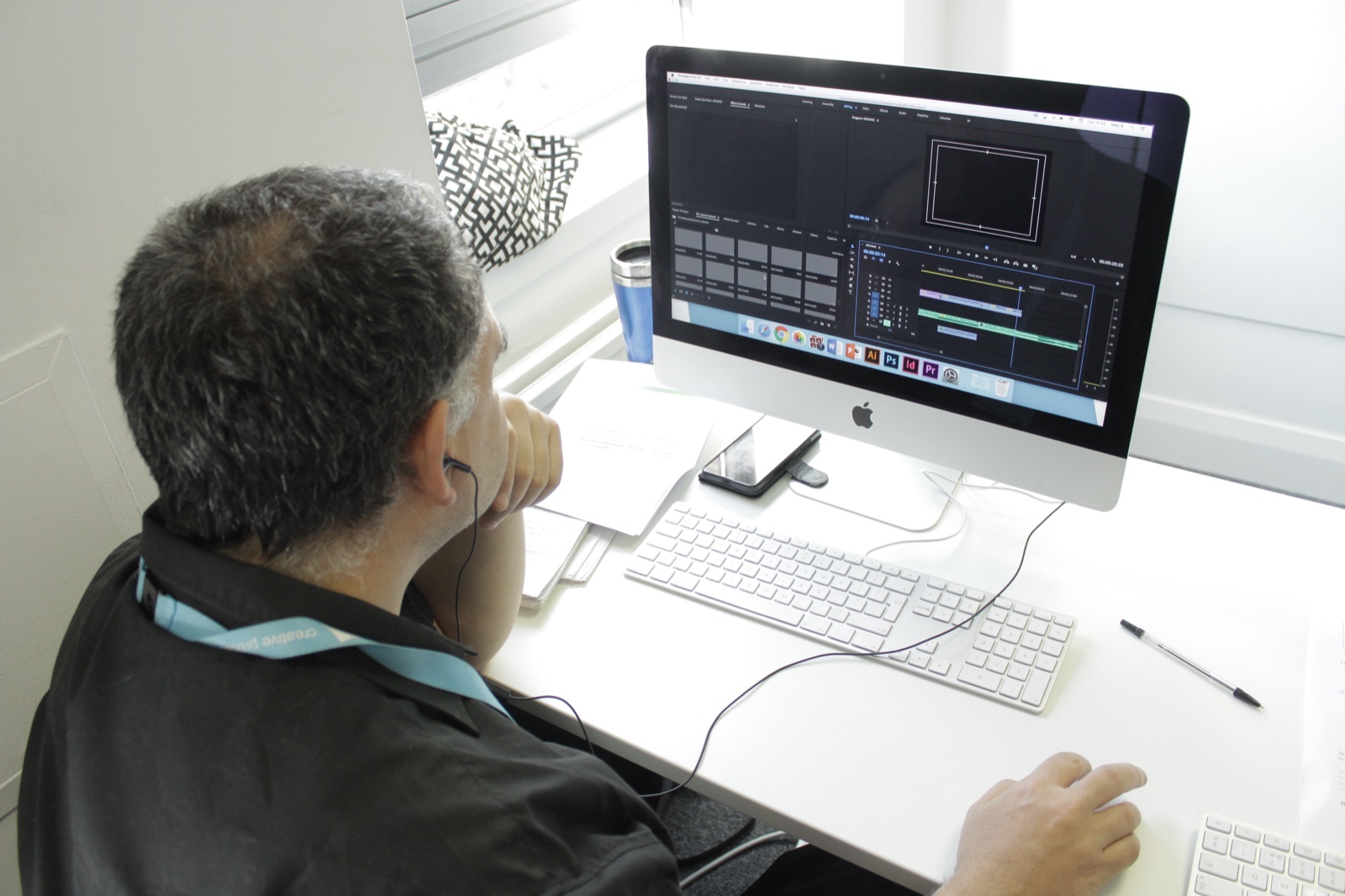 CPD individual editing in Adobe Premiere Pro on an iMac in the Mac training suite at Telecom House, Brighton